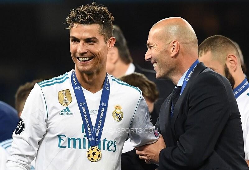 Ronaldo và Zidane cười tươi sau chức vô địch Champions League 2017/18. (Ảnh: Daily Star)