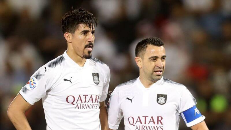 Xavi cũng từng sát cánh với Baghdad Bounedjah với vai trò cầu thủ